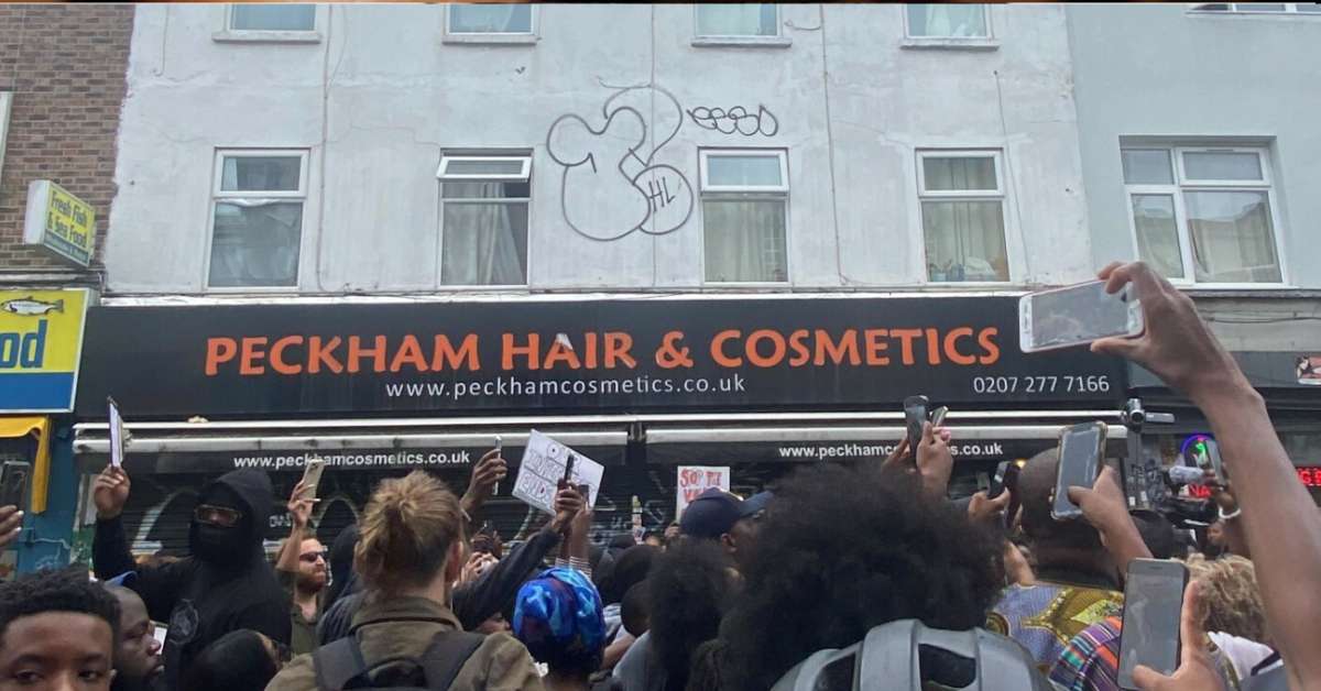 Peckham Hair Shop Rebrands as 'Kings and Queens' Amid Ongoing Boycott and Community Backlash
